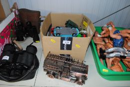 A box containing various Die-cast and other vehicles