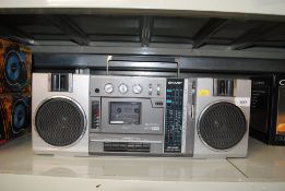 A Sharp stereo radio cassette player