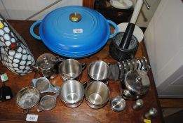 A Le Creuset style dish and cover, pestle and mortar, stainless steel tea ware etc