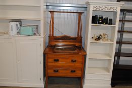 A satin walnut dressing chest fitted two long drawers