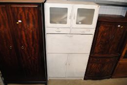 A retro white painted kitchen cabinet