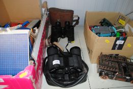 A pair of Hanimex 10x50 Binoculars and a pair of Wray 9x40 Binoculars in case