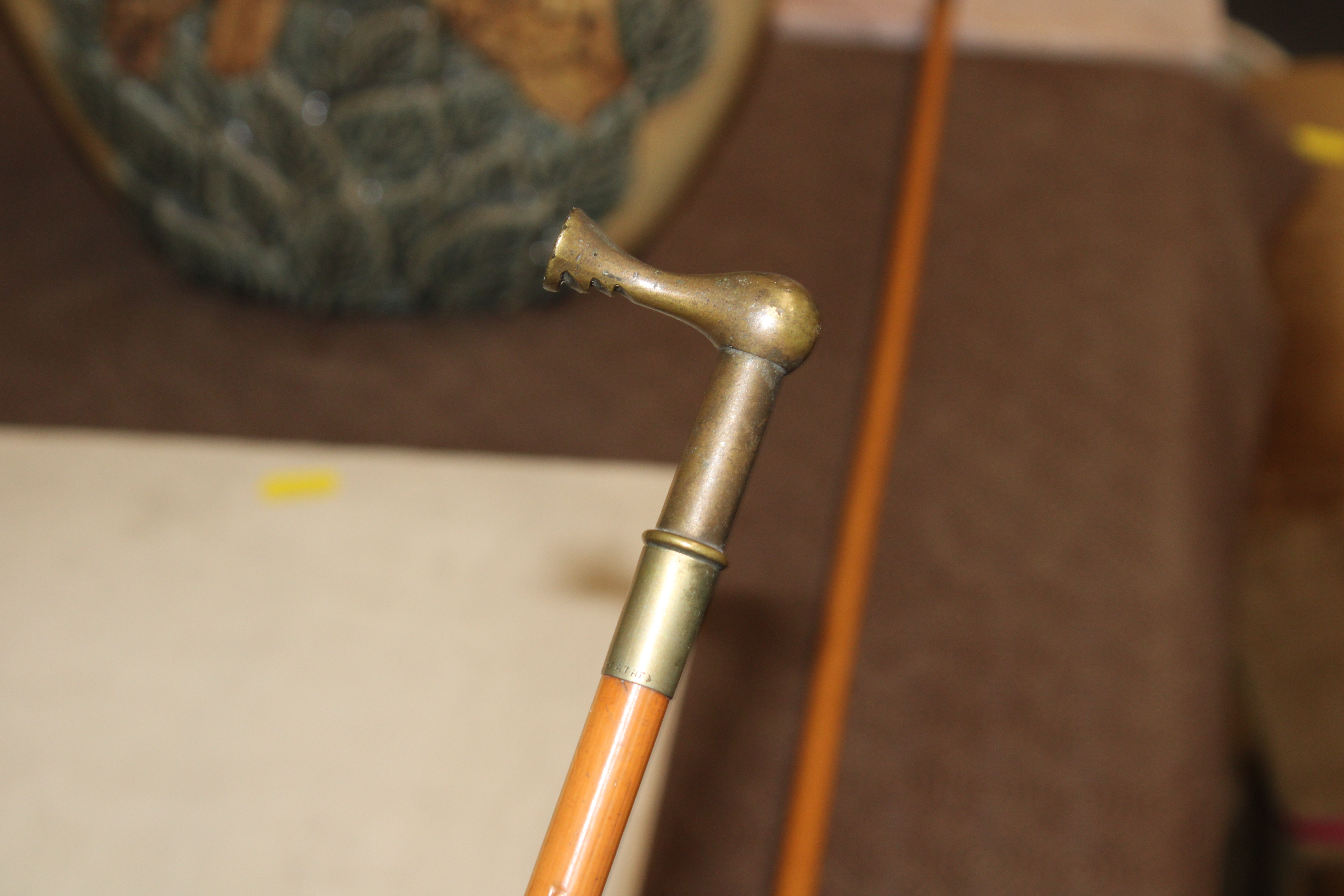 A silver topped swagger stick and a brass handled - Image 6 of 12