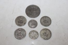 A box containing 1929 half crown, a 1926 sixpence,