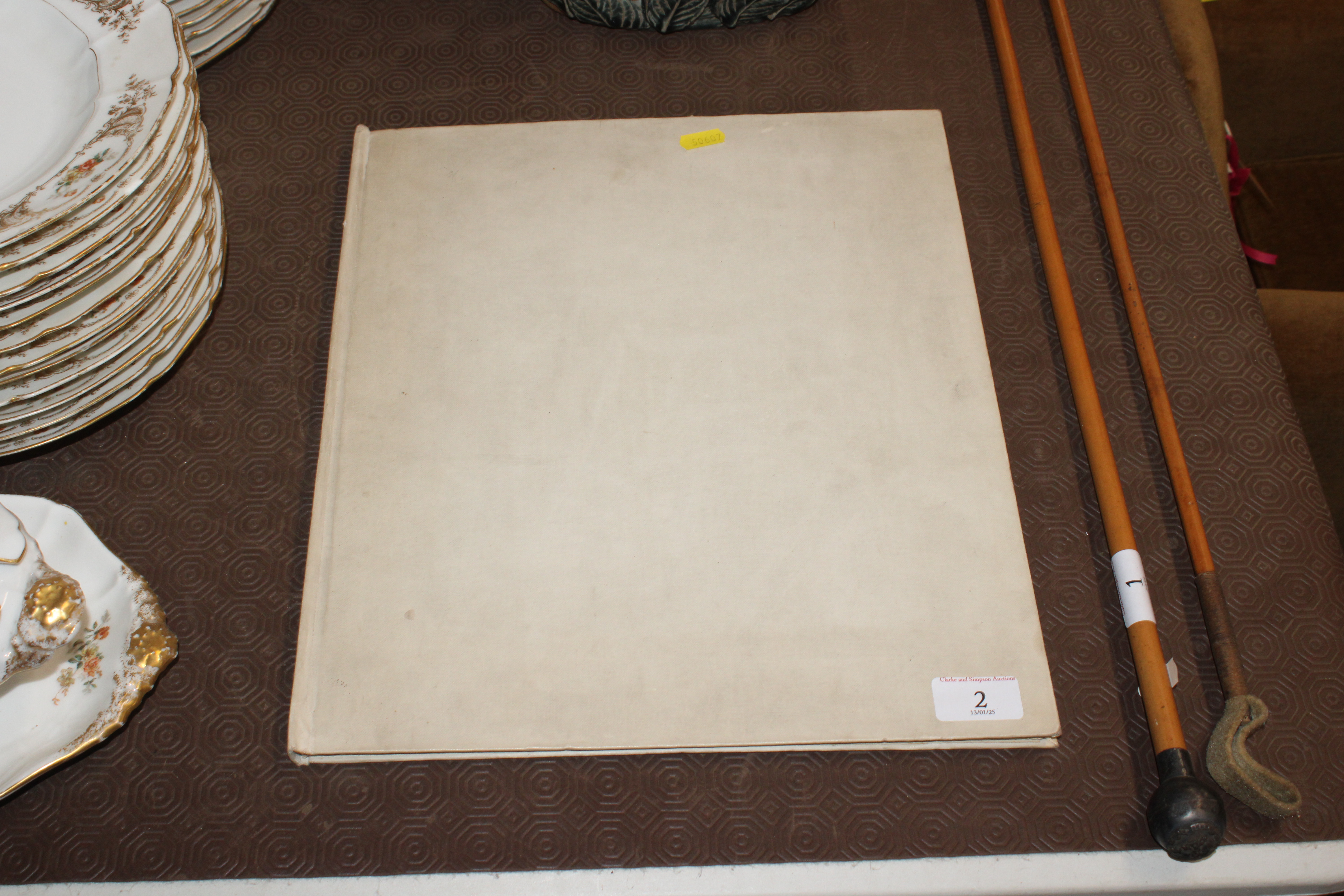 A folder containing seven coloured plates "The Man