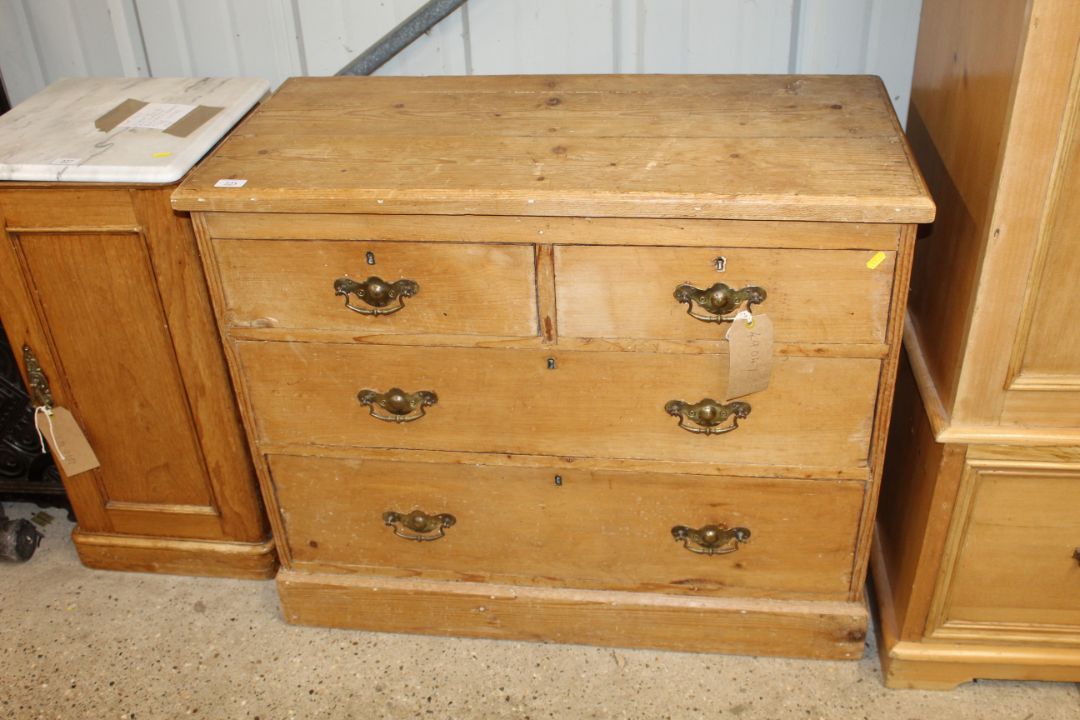 An antique stripped pine chest fitted two short ov - Image 1 of 3