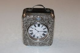 A very large pocket watch in silver mounted travel