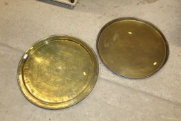 Two Eastern brass trays