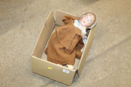 An antique German porcelain doll