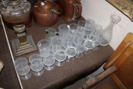 A collection of Biot clear bubble glass tableware