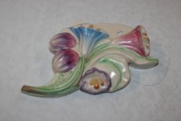 A Clarice Cliff floral decorated wall pocket