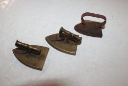 Three miniature lace irons