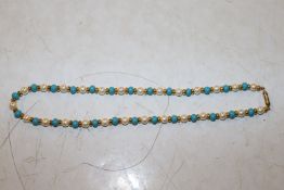 A gilt metal necklace