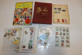 A collection of stamps to include two albums and l