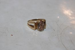 A yellow metal (marked 14K) ring with rose gold me