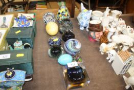 A quantity of various glass paperweights to includ