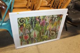 A framed and glazed jig saw puzzle