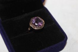 A yellow metal ring (marked 14K) set with hexagona