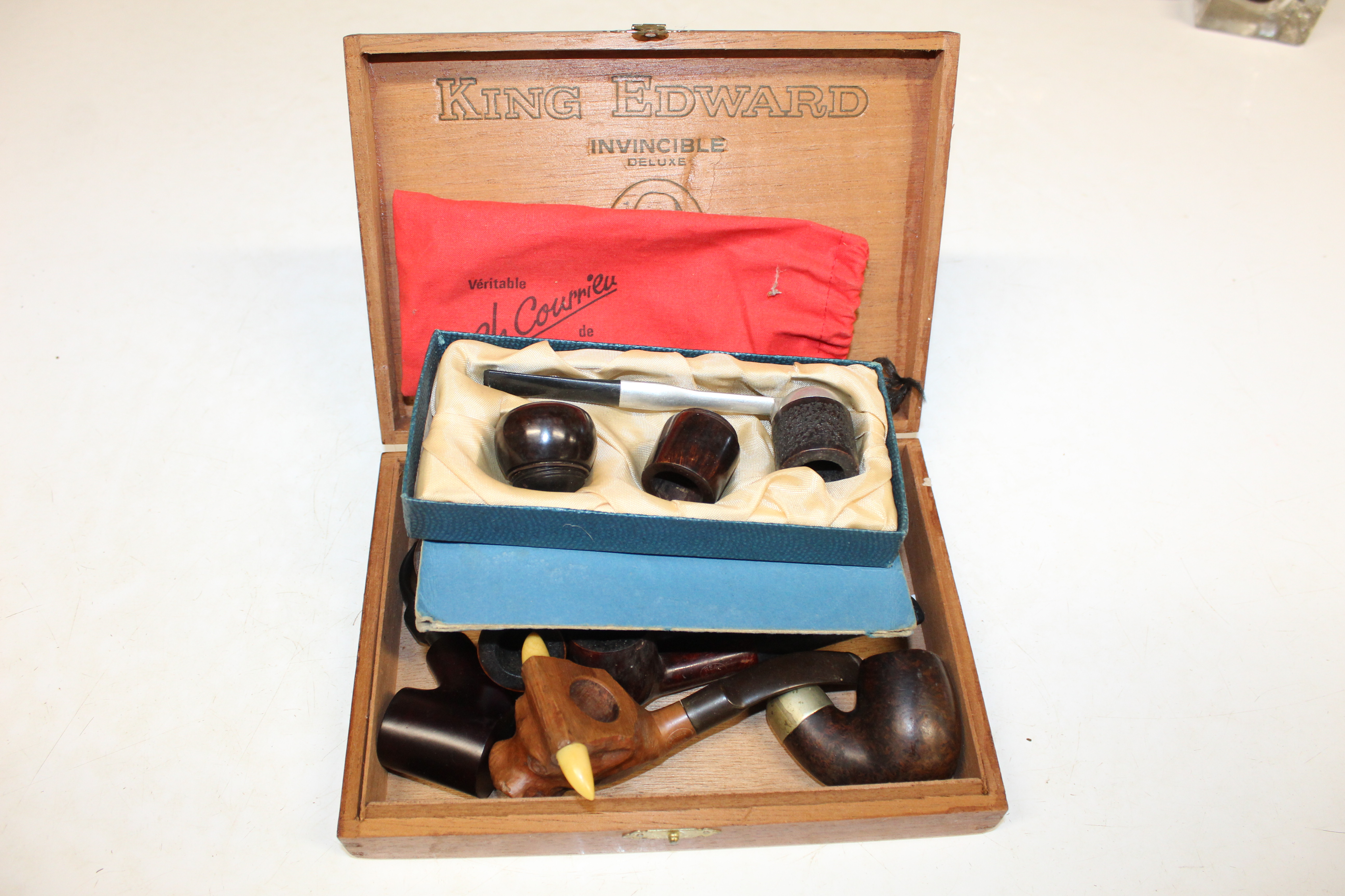 A Pukeberg Sweden glass pipe rest; a carved wooden - Image 6 of 11