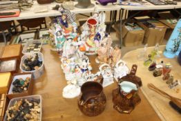 A quantity of Staffordshire flat back figures and