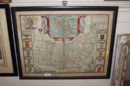 An antique hand coloured map of Suffolk