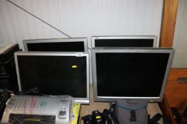 Three Phillips monitors and one other