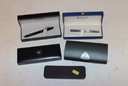 A collection of various boxed pens to include Wate
