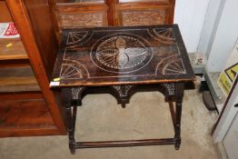 An oak carved side table