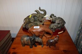 Five various ornaments in the form of elephants, some AF