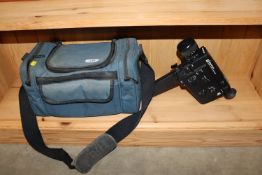 A Sankyo Supertronic camcorder and case