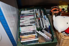 A box containing various video games