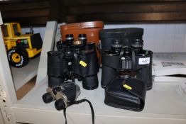 Four pairs of binoculars