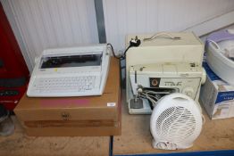 A Singer 438 sewing machine and case, a Brother ty
