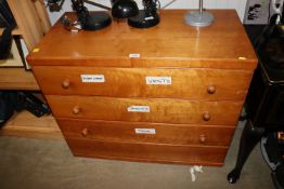 A pine chest fitted four long drawers