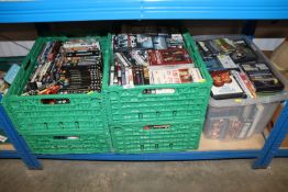 Five boxes containing various DVD's