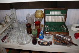 A canteen of cutlery with part contents; various g