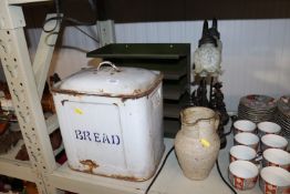 An enamel bread bin AF; a pottery jug; metal filin