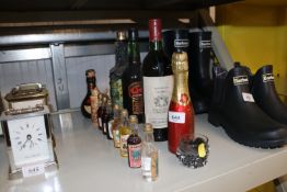 A collection of various alcohol and miniatures