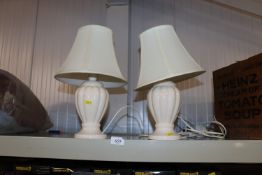 A pair of table lamps