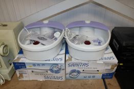 Two Sanitas foot spas