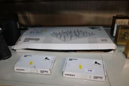 Two IKEA Variera expanding saucepan organisers and