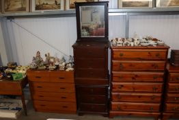 A pair of Stag style bedside chests fitted three drawers together with a dressing table mirror
