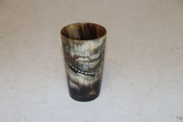 A horn beaker engraved 