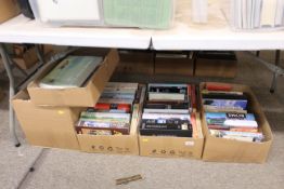 A collection of books mostly modern hardbacks, His