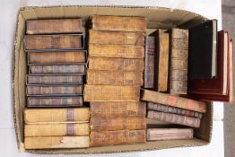 A collection of antiquarian leather bound books to