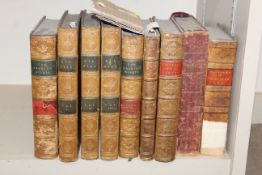 A collection of leather bound books to include 