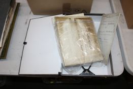 A file box containing miscellaneous old indentures