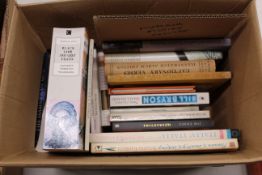 A box of various books including Fiction, Travel e