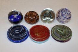 Six Alum Bay glass coasters and four glass paperwe