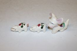 A Plichta pottery dog with hand painted decoration